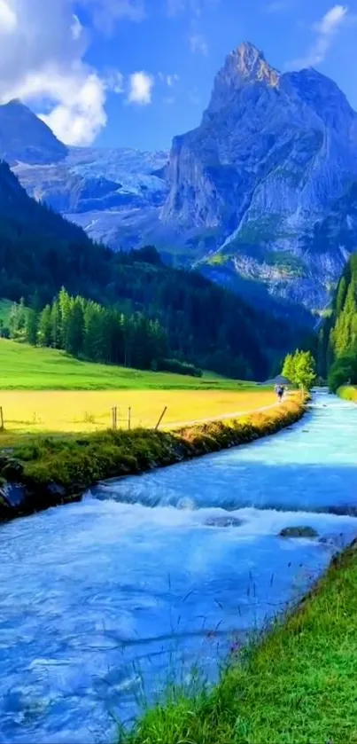 Serene mountain stream with lush green valley and towering peaks.