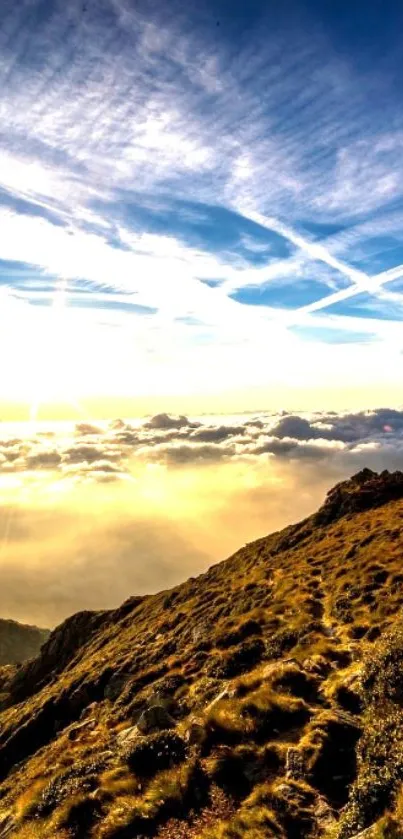 Majestic mountain sunrise with clouds and vibrant sky.