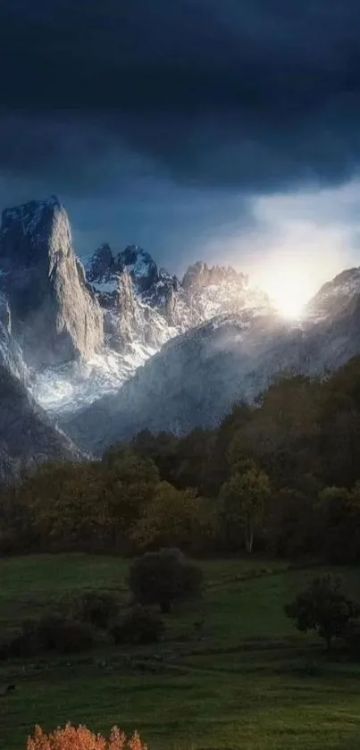 Mountain range at sunrise with lush green pastures.