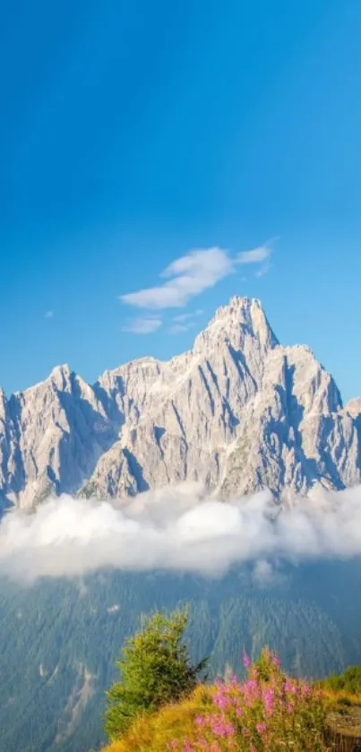 Majestic mountain with blue sky and fluffy clouds.