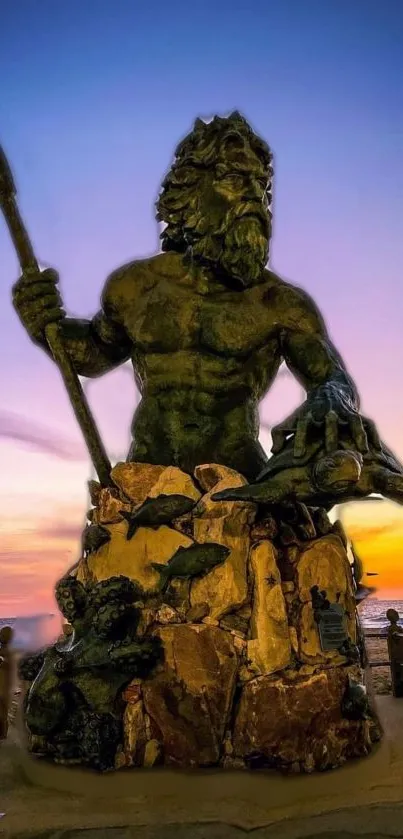 Neptune statue silhouetted against a vibrant sunset.