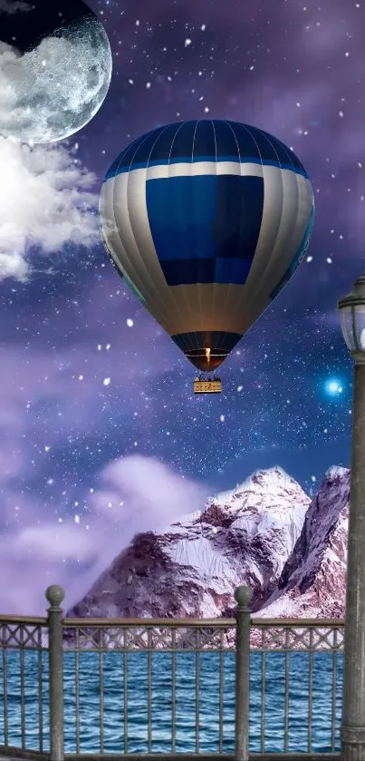 Hot air balloon under moonlit purple sky with mountains.