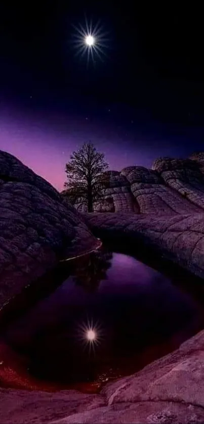 Starry night sky with reflection and rocky landscape wallpaper.