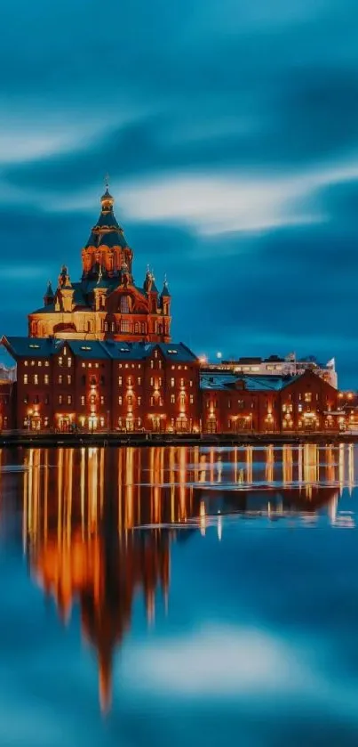 Majestic cityscape at night with glowing reflections on water.