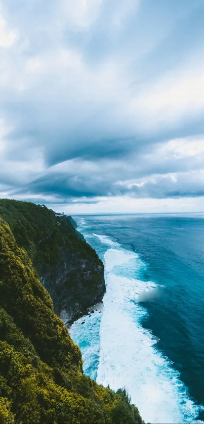 Majestic ocean cliff with a dramatic cloudy sky.