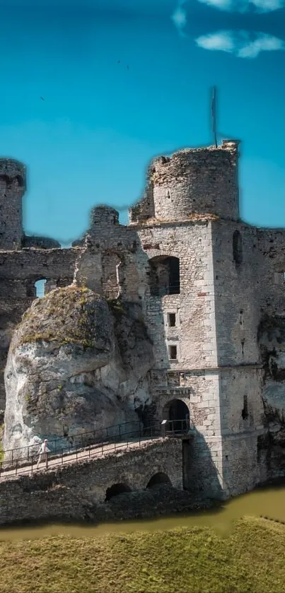 Majestic old castle with a bright blue sky backdrop.