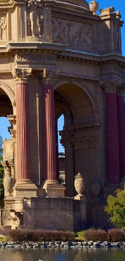 Majestic palace with columns by a serene lake.