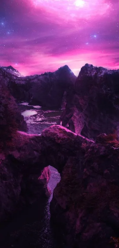 A pink cosmic sky above rocky landscapes, creating a mystic and elegant mobile wallpaper.