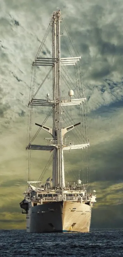 A majestic sailboat on the ocean with dramatic skies.