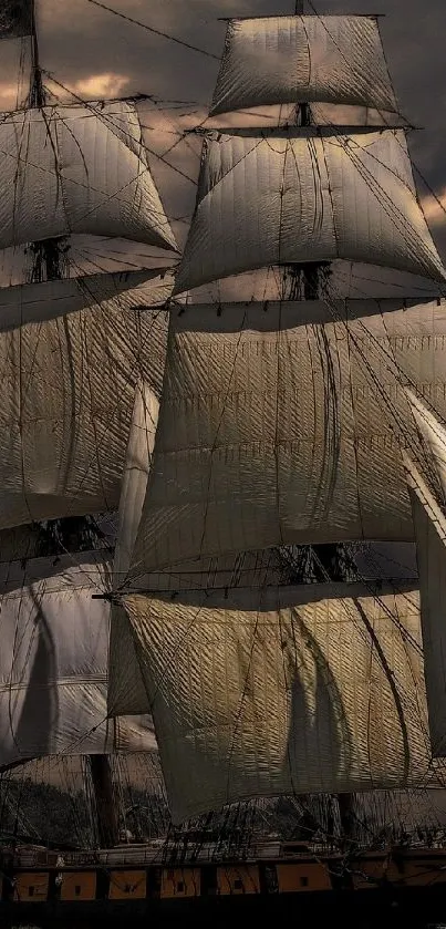 Majestic sailing ship in a dramatic setting with dark sails and vivid sky.