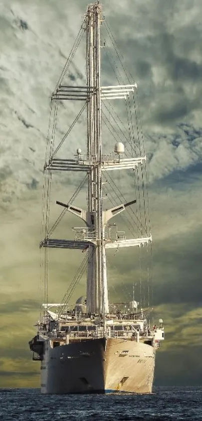 Majestic ship sailing under dramatic skies on the ocean.