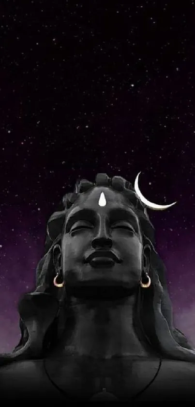 Shiva statue with a crescent moon against a starry sky.