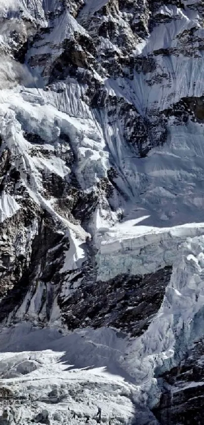 Mobile wallpaper of a snow-capped mountain peak.