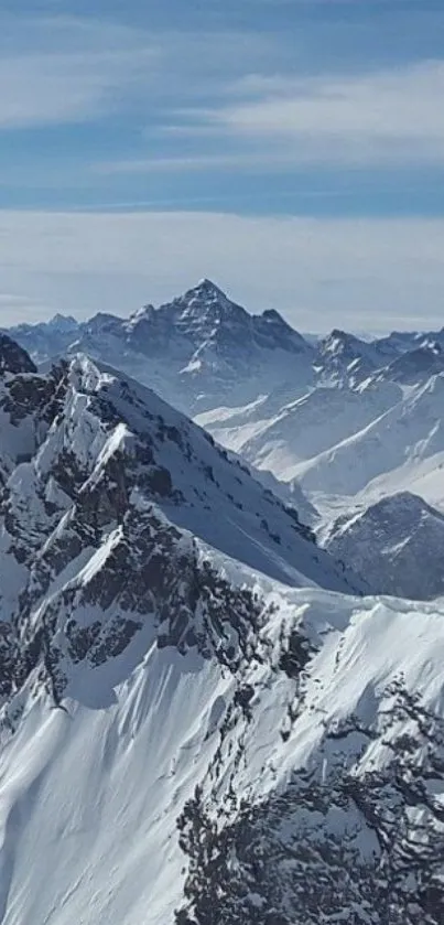 Snowy mountain peaks under a clear blue sky.