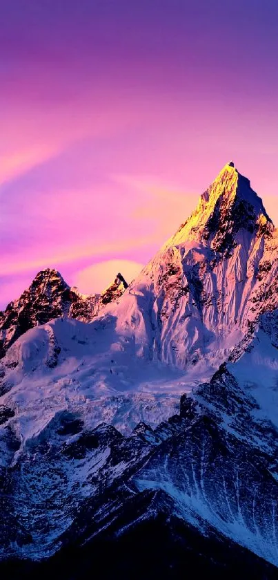 Majestic mountain peaks under a vibrant sunset sky.