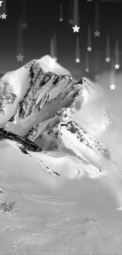 Snowy mountain peaks under a cloudy sky in black and white.