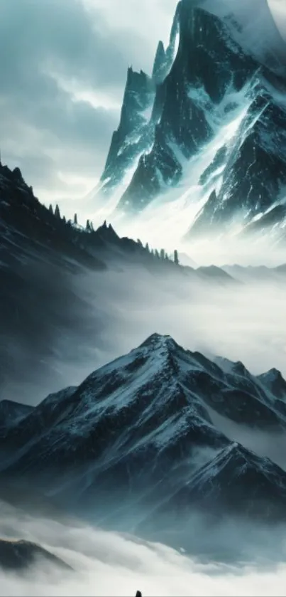 Snowy mountain peaks with misty valleys create a stunning natural wallpaper.