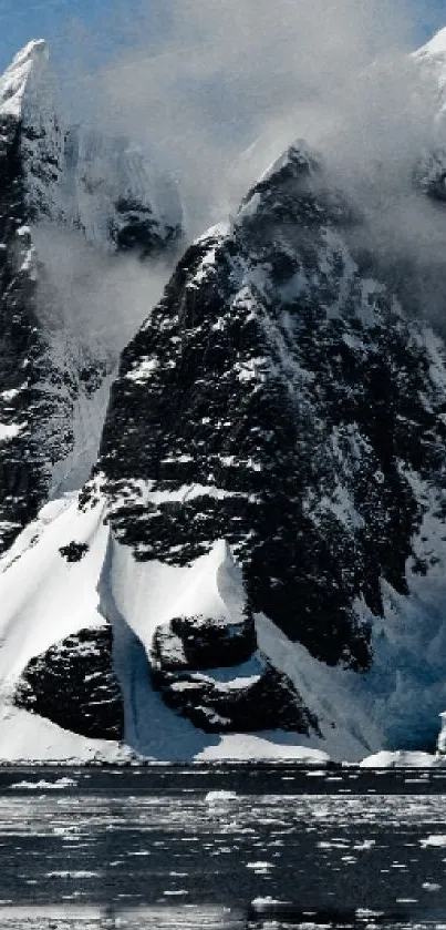 Snowy mountains with icy peaks and a serene cloudy sky.