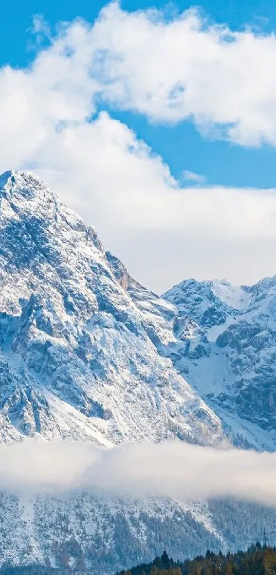 Serene snowy mountain landscape under clear blue sky.