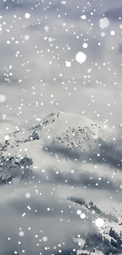 Snowy mountain with clouds and stunning natural scenery.