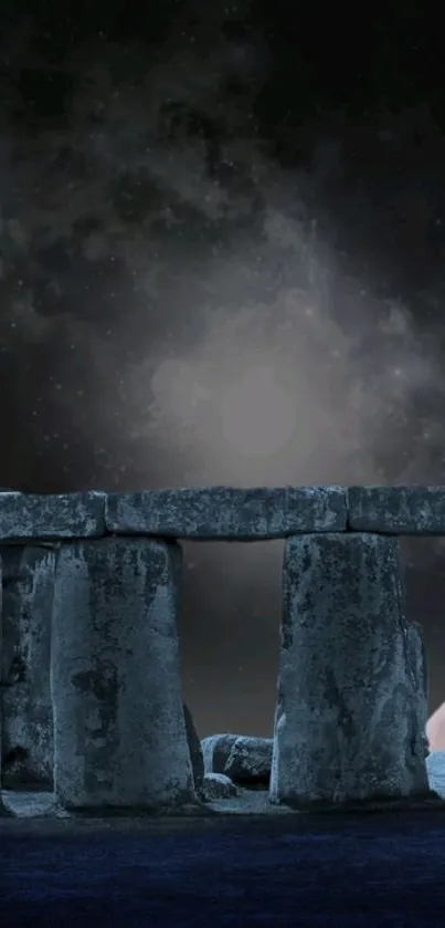 Stonehenge under a starry night sky with celestial backdrop.