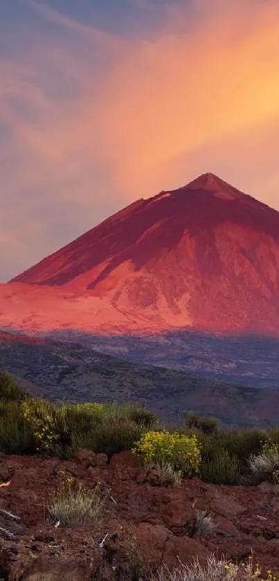 Vibrant mountain scene with a sunset sky, perfect for mobile wallpaper.