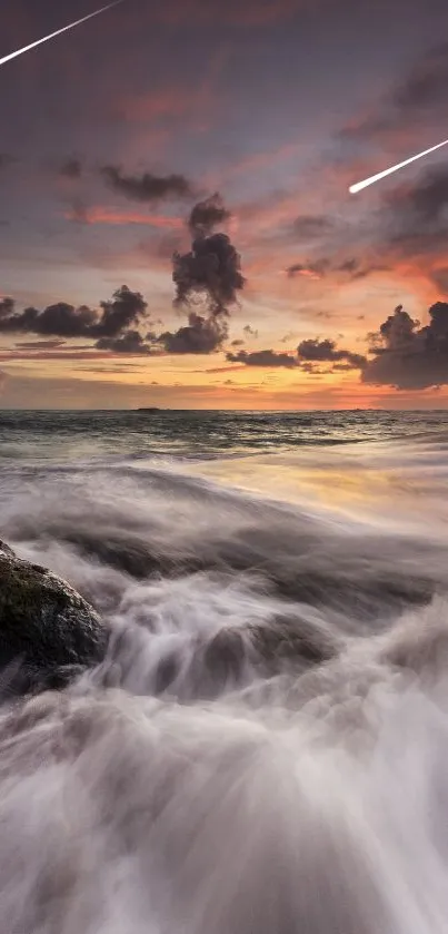 Sunset over ocean with vibrant clouds and waves.