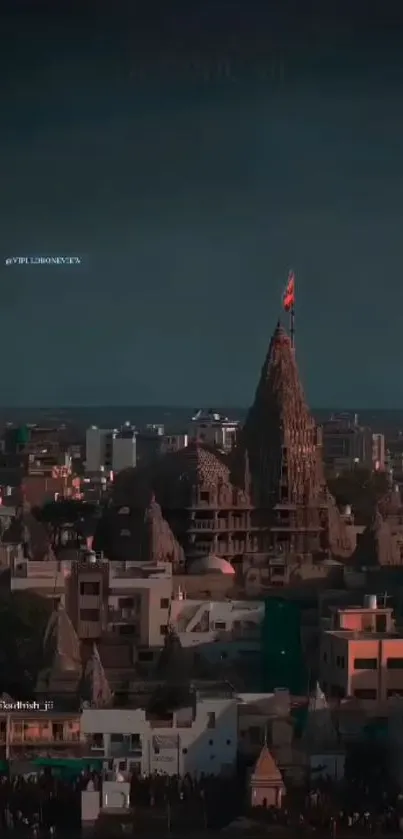 A majestic temple stands tall amidst a cityscape at dusk.