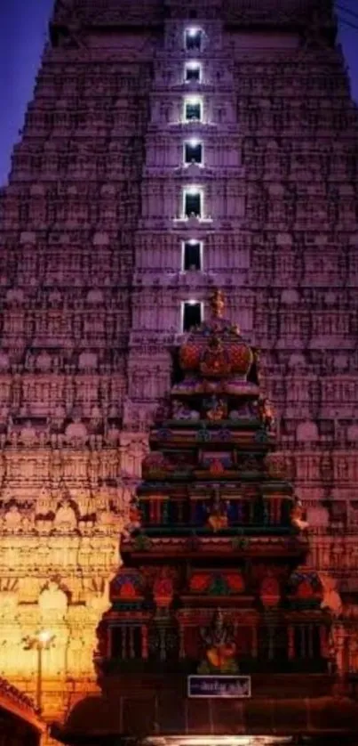 Majestic view of a brightly lit temple at night showcasing intricate architecture.