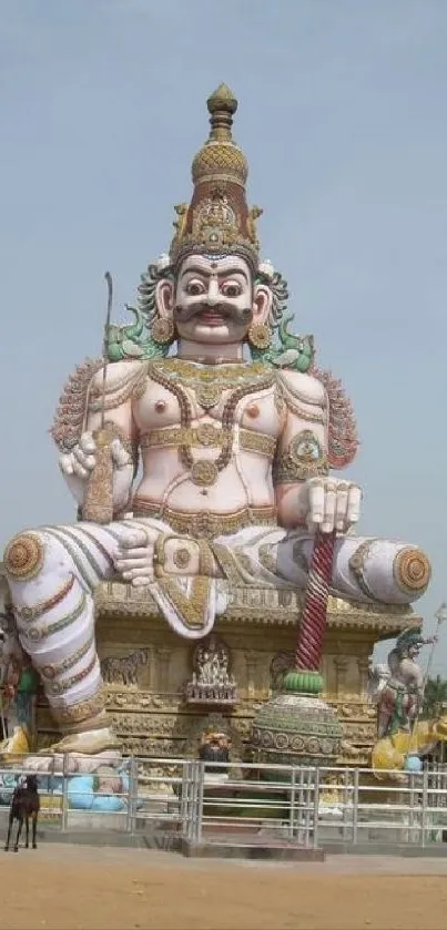 Large ornate statue in temple setting