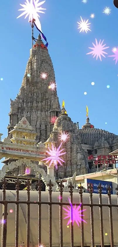 Majestic temple with intricate carvings against a blue sky.