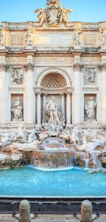 Trevi Fountain in Rome under a clear blue sky, showcasing detailed sculptures.