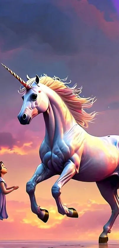 A majestic unicorn rearing against a colorful sunset with a girl gazing in awe.