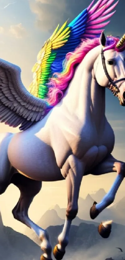 Majestic unicorn with rainbow wings in a mountain setting.