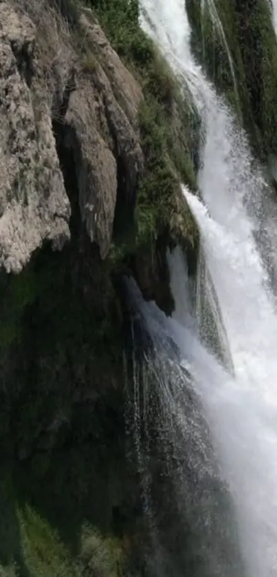 Majestic cascading waterfall with lush greenery.