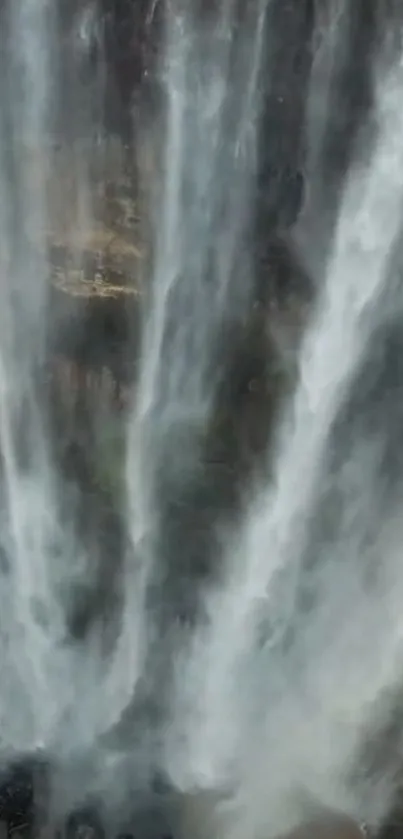 Vertical mobile wallpaper with cascading waterfall.