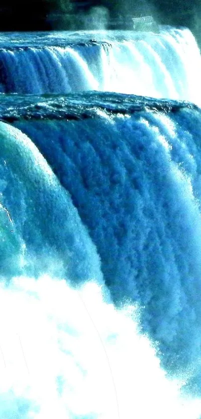 Majestic waterfall cascading in blue serenity.