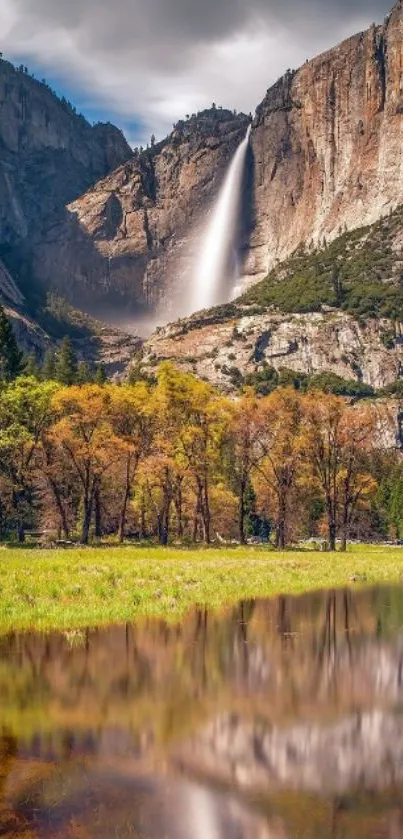 Majestic waterfall by a mountain, reflected in a calm river.