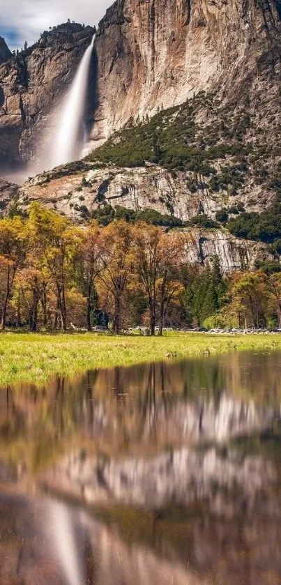 Majestic waterfall with vibrant reflections in serene scenery.