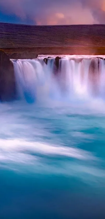 Captivating waterfall with vibrant blue and white hues, perfect for mobile wallpapers.