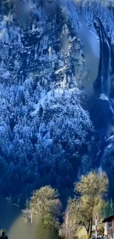 Majestic winter waterfall with snow-capped trees in serene nature setting.