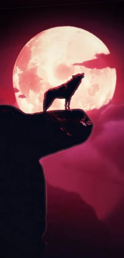 Wolf silhouette howls at full crimson moon on rocky cliff.