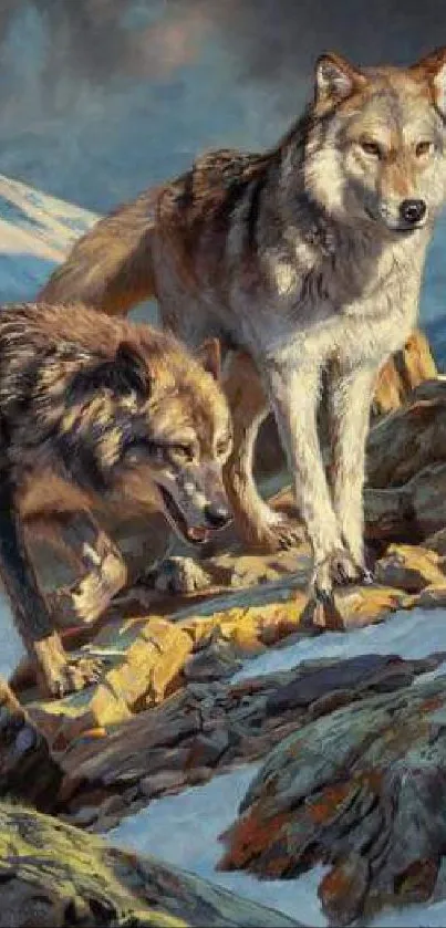 Two wolves on rocky terrain with mountain backdrop.