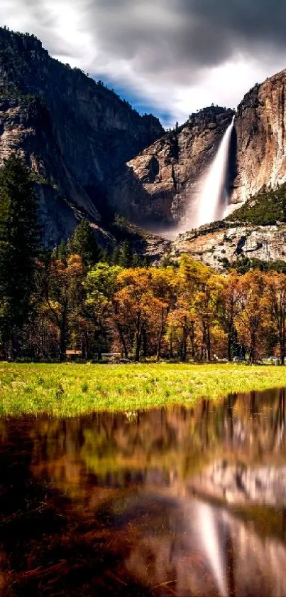 Yosemite waterfall with forest and reflection in tranquil landscape.