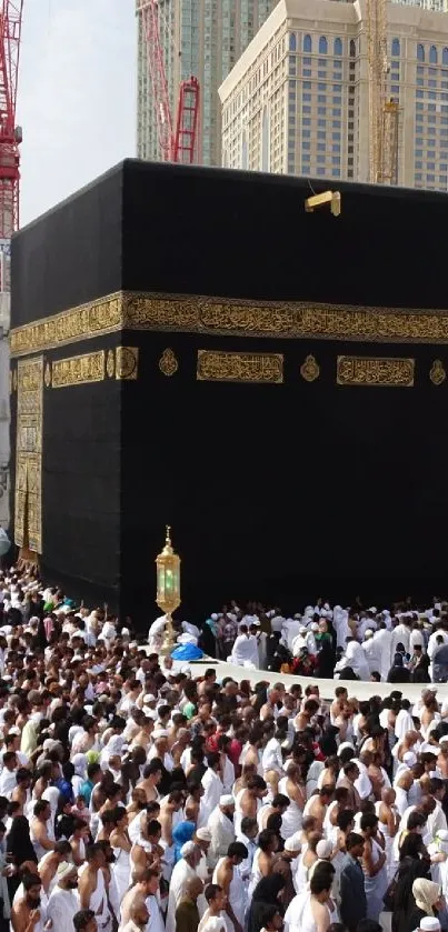 Crowd gathered at the Kaaba in Makkah, a spiritual pilgrimage site.