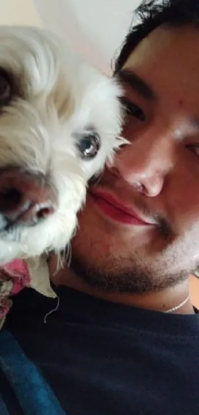 Man smiling with his dog in close-up portrait.