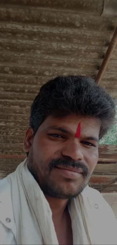 Portrait of a man with a calming rustic background.