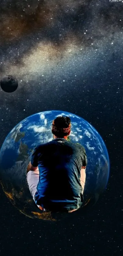 Man sitting on Earth with galaxy backdrop.