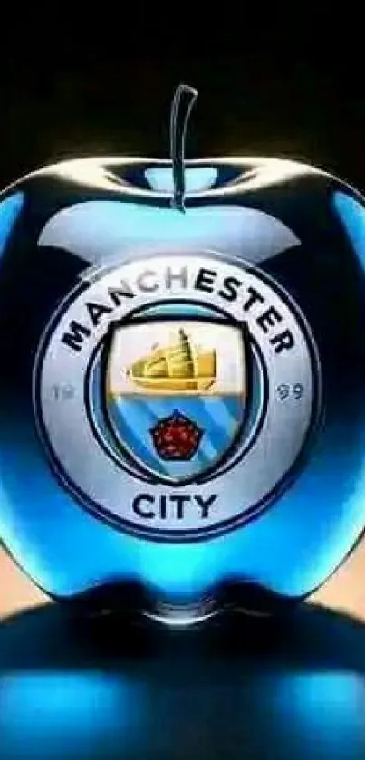 Manchester City logo on a blue apple design wallpaper.