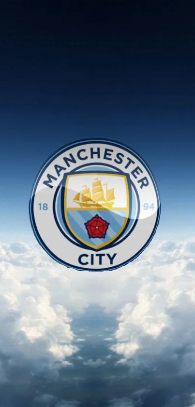 Manchester City emblem on a blue sky with clouds wallpaper.